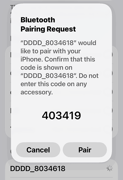 Bluetooth pairing code dialog on the phone with a Pair button below